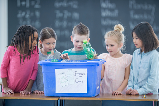 Father Teaches Children How to Recycle Right